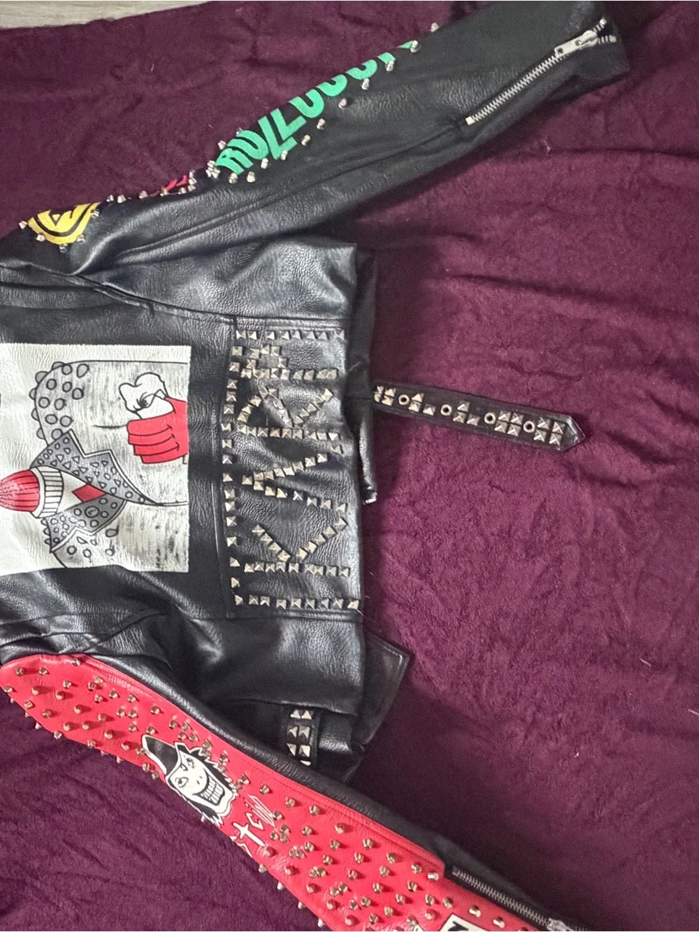 Black Studded Leather Biker Jacket with Graphic Accents
